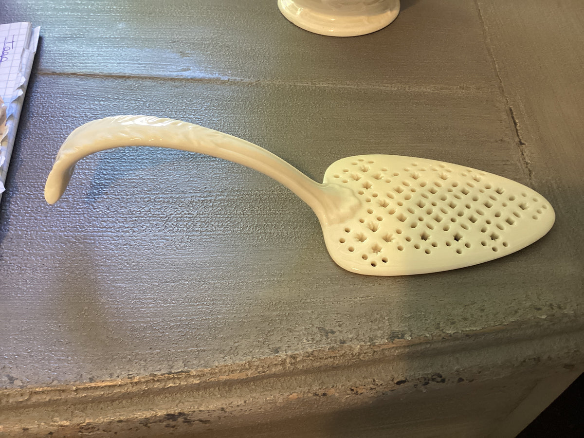 CREAM COLORED PIERCED SERVER